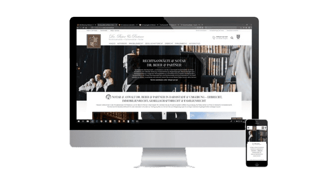 notary in Darmstadt website screenshot inside a mac computer screen and iphone